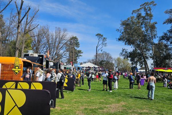 Attendees buying food at vendors